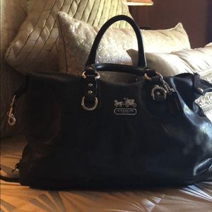Coach black leather handbag.